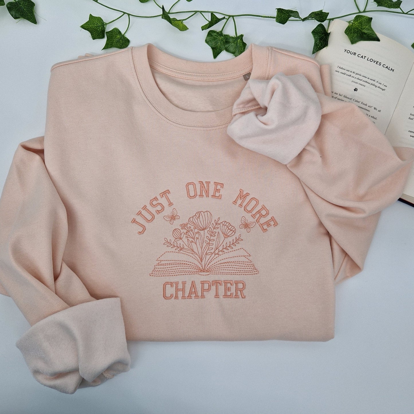One more chapter hoodie with self coloured embroidery